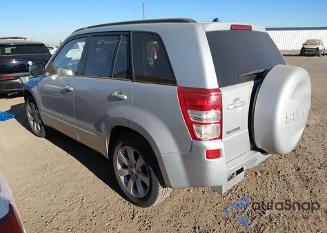 2009 Suzuki Grand Vitara Luxury V6 из США, поврежденный, VIN JS3TD149194100311